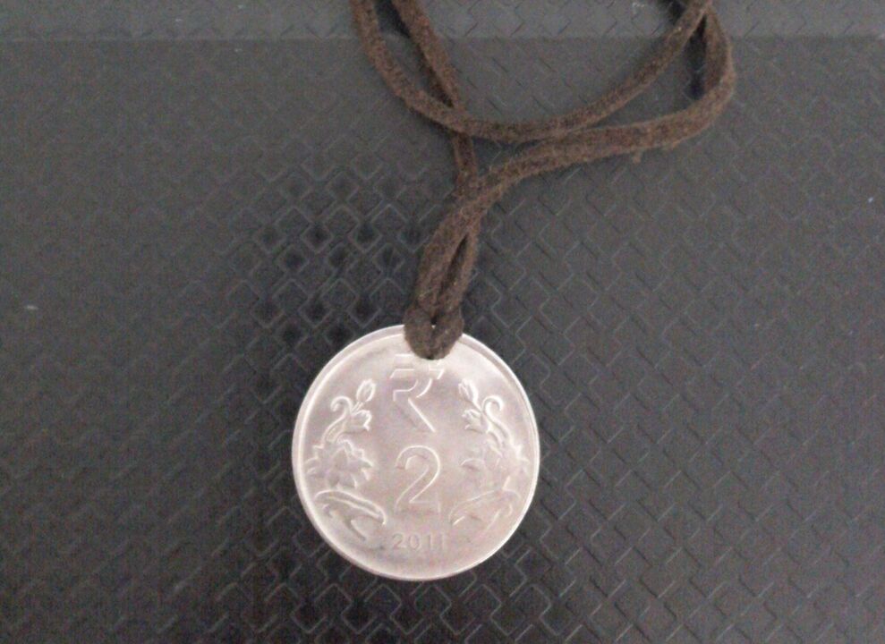 amuleta monēta, lai piesaistītu bagātību